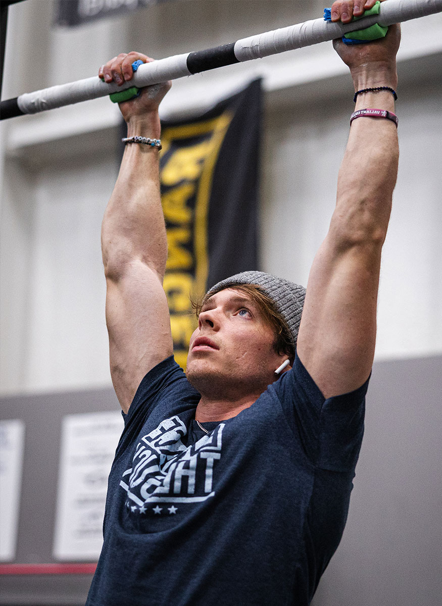 Coach doing pull ups
